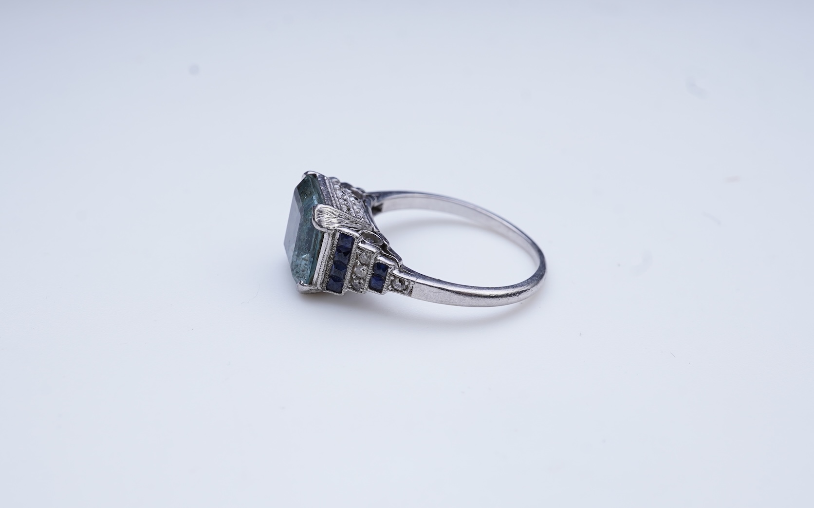An aquamarine, sapphire and diamond ring